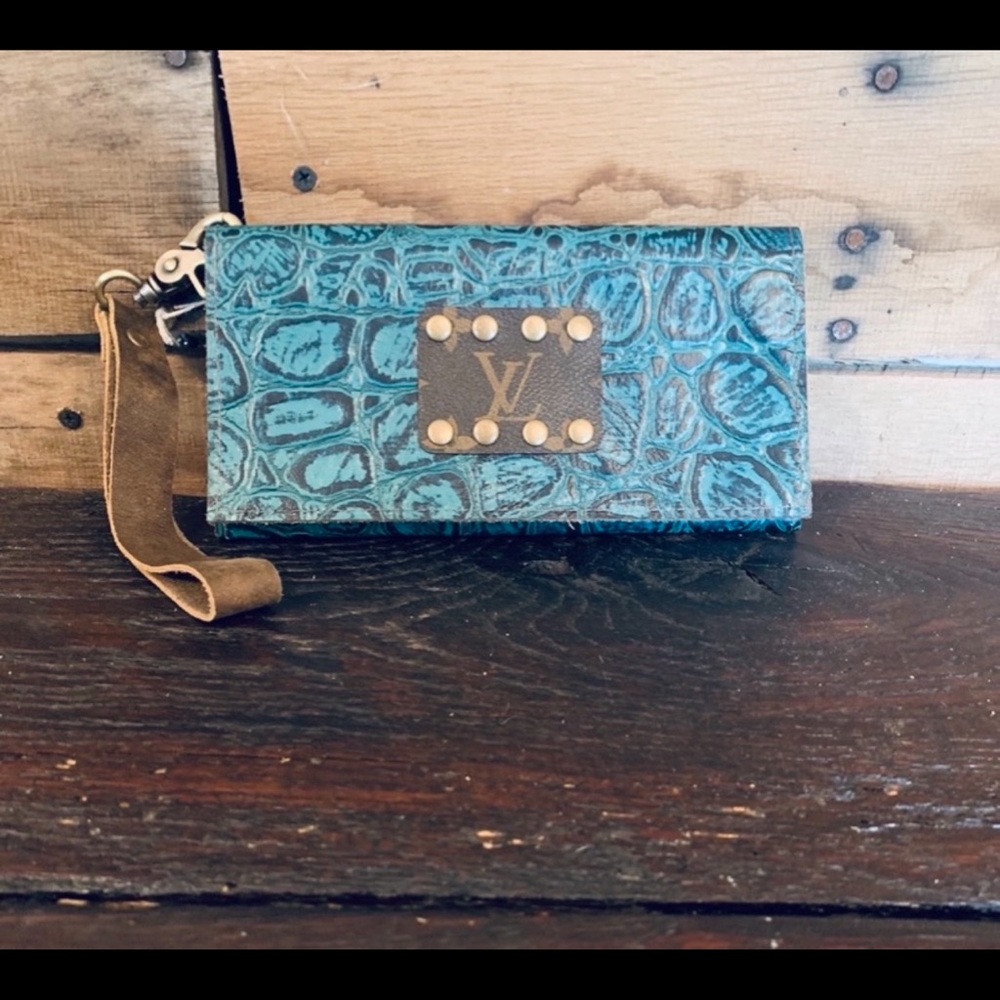 KIG trifold wallet or wristlet.
